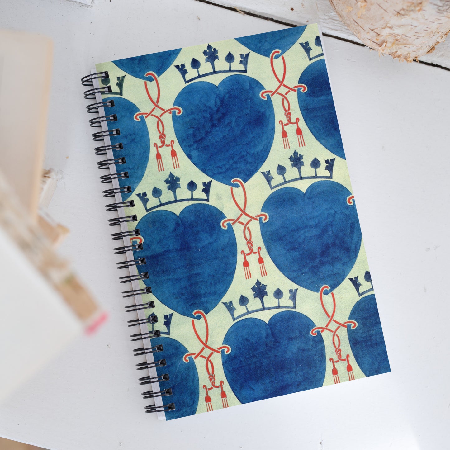 Spiral notebook featuring The Union of Hearts," by C.F.A. Voysey, 1899.