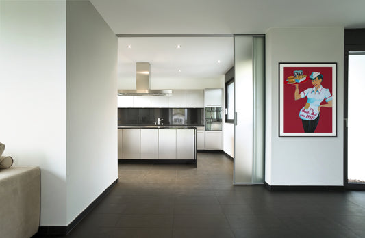 Modern kitchen with a framed poster on the wall
